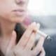 close up image of woman smoking