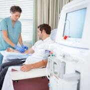 Nurse working with a patient